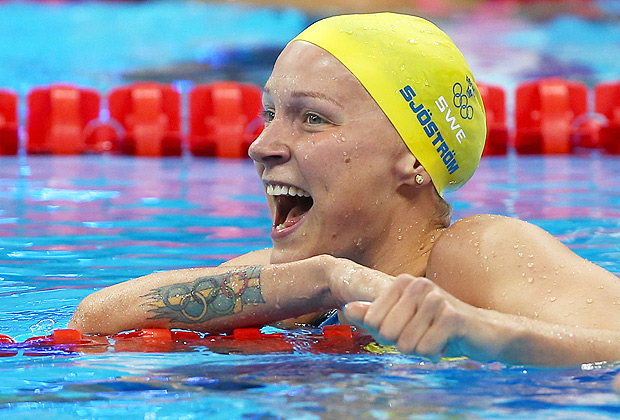 2016 Rio Olympics - Swimming - Semifinal - Women's 100m Butterfly Semifinals - Olympic Aquatics Stadium - Rio de Janeiro, Brazil - 06/08/2016. Sarah Sjostrom (SWE) of Sweden celebrates after setting a new Olympic record. REUTERS/Michael Dalder FOR EDITORIAL USE ONLY. NOT FOR SALE FOR MARKETING OR ADVERTISING CAMPAIGNS. ORG XMIT: OLYVP126