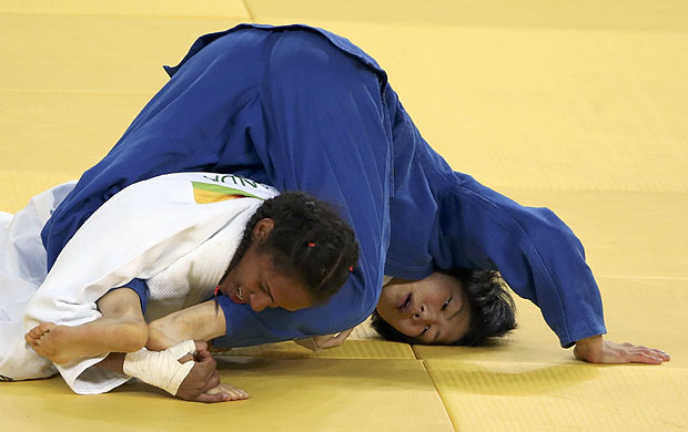 2016 Rio Olympics - Judo - Final - Women -52 kg Bronze Medal Contests - Carioca Arena 2 - Rio de Janeiro, Brazil - 07/08/2016. Erika Miranda (BRA) of Brazil and Misato Nakamura (JPN) of Japan compete. REUTERS/Adrees Latif FOR EDITORIAL USE ONLY. NOT FOR SALE FOR MARKETING OR ADVERTISING CAMPAIGNS. ORG XMIT: ALP84