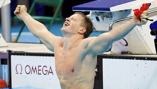 2016 Rio Olympics - Swimming - Final - Men's 100m Breaststroke Final - Olympic Aquatics Stadium - Rio de Janeiro, Brazil - 07/08/2016. Adam Peaty (GBR) of United Kingdom celebrates setting a new world record. REUTERS/Dominic Ebenbichler TPX IMAGES OF THE DAY FOR EDITORIAL USE ONLY. NOT FOR SALE FOR MARKETING OR ADVERTISING CAMPAIGNS. ORG XMIT: VP140