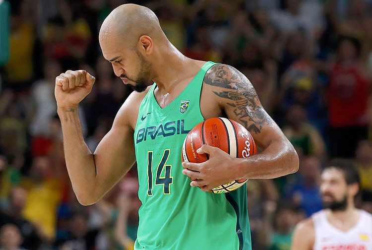 2016 Rio Olympics - Basketball - Preliminary - Men's Preliminary Round Group B Spain v Brazil - Carioca Arena 1 - Rio de Janeiro, Brazil - 09/08/2016. Marquinhos (BRA) (Basketball) of Brazil celebrates after scoring the winning basket. REUTERS/Jim Young TPX IMAGES OF THE DAY FOR EDITORIAL USE ONLY. NOT FOR SALE FOR MARKETING OR ADVERTISING CAMPAIGNS. ORG XMIT: MJB28