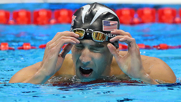 United States' Michael Phelps reacts after placing second in the men's 100-meter butterfly final during the swimming competitions at the 2016 Summer Olympics, Friday, Aug. 12, 2016, in Rio de Janeiro, Brazil. (AP Photo/Lee Jin-man) ORG XMIT: OSWM247