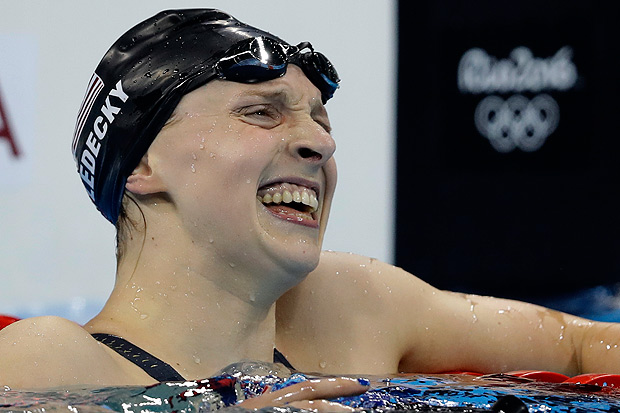United States' Katie Ledecky celebrates after the women's 800-meter freestyle final during the swimming competitions at the 2016 Summer Olympics, Friday, Aug. 12, 2016, in Rio de Janeiro, Brazil. (AP Photo/Michael Sohn) ORG XMIT: OSWM266