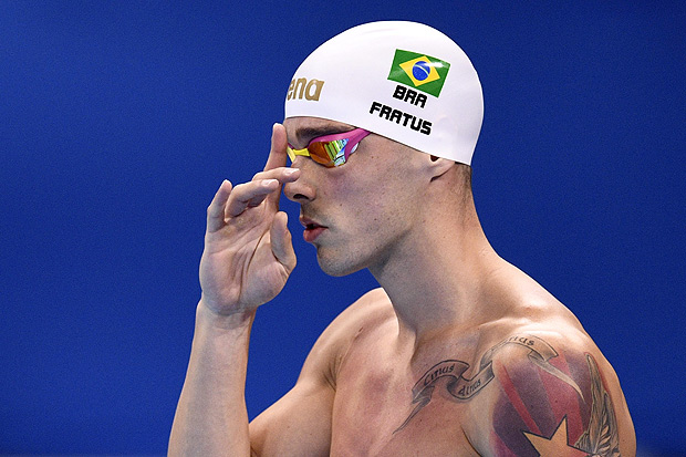 Brazil's Bruno Fratus geatures as he arrives to compete in the Men's 50m Freestyle Semifinal during the swimming event at the Rio 2016 Olympic Games at the Olympic Aquatics Stadium in Rio de Janeiro on August 11, 2016. / AFP PHOTO / Martin BUREAU