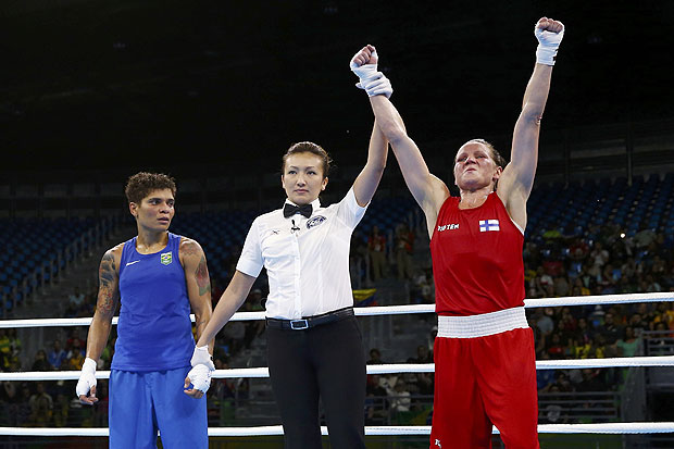 2016 Rio Olympics - Boxing - Preliminary - Women's Light (60kg) Round of 16 Bout 131 - Riocentro - Pavilion 6 - Rio de Janeiro, Brazil - 12/08/2016. Mira Potkonen (FIN) of Finland celebrates after winning her bout against Adriana Araujo (BRA) of Brazil. REUTERS/Peter Cziborra FOR EDITORIAL USE ONLY. NOT FOR SALE FOR MARKETING OR ADVERTISING CAMPAIGNS. ORG XMIT: OLYDH121