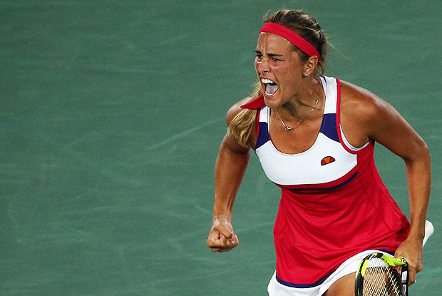 2016 Rio Olympics - Tennis - Final - Women's Singles Gold Medal Match - Olympic Tennis Centre - Rio de Janeiro, Brazil - 13/08/2016. Monica Puig (PUR) of Puerto Rico reacts during match against Angelique Kerber (GER) of Germany. REUTERS/Kevin Lamarque FOR EDITORIAL USE ONLY. NOT FOR SALE FOR MARKETING OR ADVERTISING CAMPAIGNS. ORG XMIT: OLYN2465