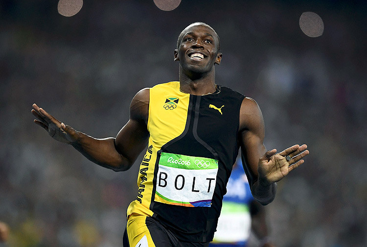 2016 Rio Olympics - Athletics - Final - Men's 100m Final - Olympic Stadium - Rio de Janeiro, Brazil 14/08/2016. Usain Bolt (JAM) of Jamaica celebrates as he crosses the finish line to win the race REUTERS/Dylan Martinez FOR EDITORIAL USE ONLY. NOT FOR SALE FOR MARKETING OR ADVERTISING CAMPAIGNS. ORG XMIT: AA194