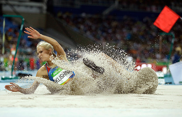 Russia's Darya Klishina competes in the women's long jump qualification, during the athletics competitions of the 2016 Summer Olympics at the Olympic stadium in Rio de Janeiro, Brazil, Tuesday, Aug. 16, 2016. (AP Photo/Matt Dunham) ORG XMIT: OATH741