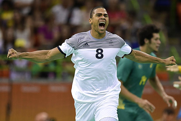 France's centre back Daniel Narcisse celebrates a goal during the men's quarterfinal handball match Brazil vs France for the Rio 2016 Olympics Games at the Future Arena in Rio on August 17, 2016. / AFP PHOTO / JAVIER SORIANO