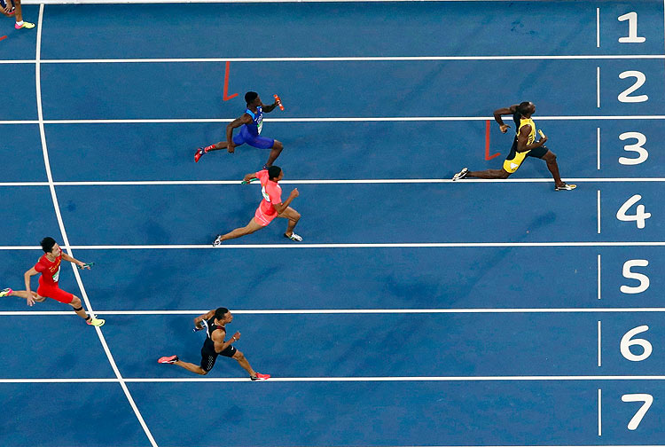 2016 Rio Olympics - Athletics - Final - Men's 4 x 100m Relay Final - Olympic Stadium - Rio de Janeiro, Brazil - 19/08/2016. Usain Bolt (JAM) of Jamaica races toward the finish line to win the gold. REUTERS/Fabrizio Bensch FOR EDITORIAL USE ONLY. NOT FOR SALE FOR MARKETING OR ADVERTISING CAMPAIGNS. ORG XMIT: OLYCN32