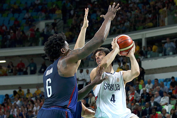 2016 Rio Olympics - Basketball - Final - Men's Gold Medal Game Serbia v USA - Carioca Arena 1 - Rio de Janeiro, Brazil - 21/8/2016. Deandre Jordan (USA) of the USA and Milos Teodosic (SRB) of Serbia compete. REUTERS/Shannon Stapleton FOR EDITORIAL USE ONLY. NOT FOR SALE FOR MARKETING OR ADVERTISING CAMPAIGNS. ORG XMIT: OLYHB33