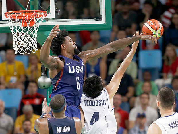 United States' DeAndre Jordan (6) blocks a shot by Serbia's Milos Teodosic (4) during the men's gold medal basketball game at the 2016 Summer Olympics in Rio de Janeiro, Brazil, Sunday, Aug. 21, 2016. (AP Photo/Eric Gay) ORG XMIT: OBKO408