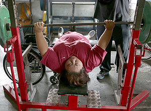 (160827) -- QUEZON CITY, Aug. 27, 2016 (Xinhua) -- Philippine powerlifter Adeline Dumapong-Ancheta attends a training session in preparation for the Rio Paralympic Games in Quezon City, the Philippines, Aug. 27, 2016. Adeline Dumapong-Ancheta, a polio victim since she was three years old, has won many medals in powerlifting events in various international competitions and is qualified to compete in the Rio Paralympic Games in September. (Xinhua/Rouelle Umali)