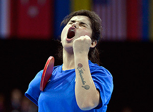 ORG XMIT: TOB505 Bruna Alexandre of Brazil reacts during her Women's Singles C10 classification table tennis match against Lei Fan of China at the London 2012 Paralympic Games August 30, 2012. China's women look likely to continue their dominance of most of the classifications of women's Paralympics table tennis, and Fan came from behind to eventually close out the match. REUTERS/Toby Melville (BRITAIN)