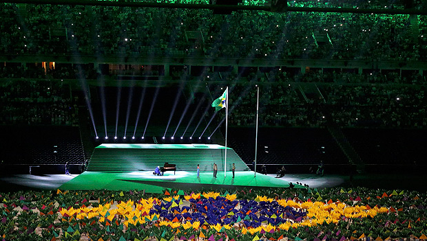 2016 Rio Paralympics - Opening ceremony - Maracana - Rio de Janeiro, Brazil - 07/09/2016. The Brazilian flag is raised during the opening ceremony. REUTERS/Sergio Moraes FOR EDITORIAL USE ONLY. NOT FOR SALE FOR MARKETING OR ADVERTISING CAMPAIGNS. ORG XMIT: OLYHB12