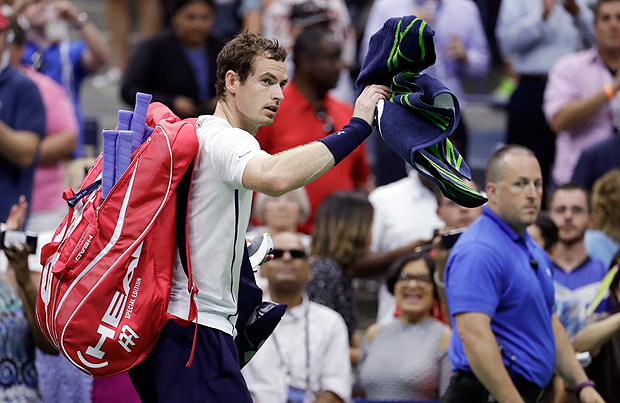 Andy Murray, of the United Kingdom, walks from the court after losing to Kei Nishikori, of Japan, during the quarterfinals of the U.S. Open tennis tournament, Wednesday, Sept. 7, 2016, in New York. (AP Photo/Julio Cortez) ORG XMIT: USO213