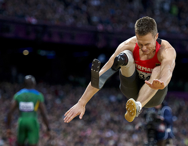 ORG XMIT: AD149 Germany's Markus Rehm competes during the men's long jump F42/44 final athletics event during the London 2012 Paralympic Games at the Olympic Stadium in east London on August 31, 2012. AFP PHOTO / ADRIAN DENNIS