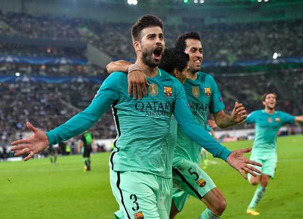 Barcelona's Gerard Pique celebrates after scoring his side's second goal during the Champions League group C soccer match between Borussia Moenchengladbach and FC Barcelona in Moenchengladbach, Germany, Wednesday, Sept. 28, 2016. (AP Photo/Martin Meissner) ORG XMIT: FOS254