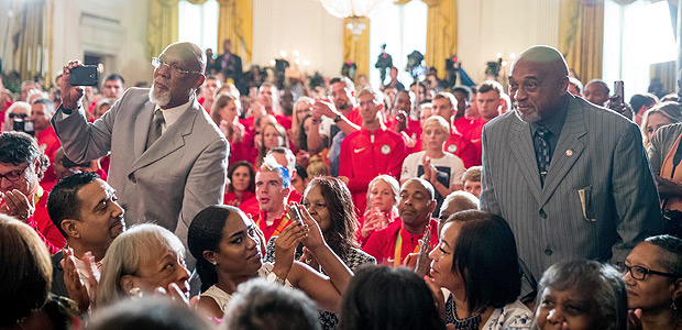 1968 US Olympic athletes Tommie Smith, right, and John Carlos, left, stand as they are recognized by President Barack Obama during a ceremony in the East Room of the White House in Washington, Thursday, Sept. 29, 2016, where the president honored the 2016 United States Summer Olympic and Paralympic Teams. Smith and Carlos extended their gloved hands skyward in racial protest during the playing of "The Star-Spangled Banner" after Smith received the gold and Carlos the bronze medal in the 200 meter run at the Summer Olympic Games in Mexico City 1968. (AP Photo/Andrew Harnik) ORG XMIT: DCAH112