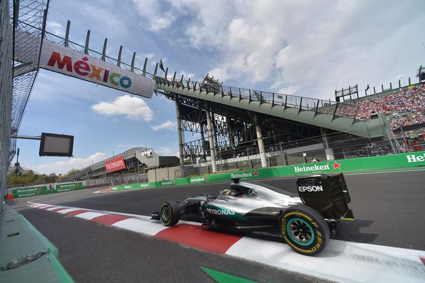 Mercedes AMG Petronas F1 Team's British driver Lewis Hamilton powers his car during the Formula One Mexico Grand Prix at the Hermanos Rodriguez circuit in Mexico City on October 30, 2016.