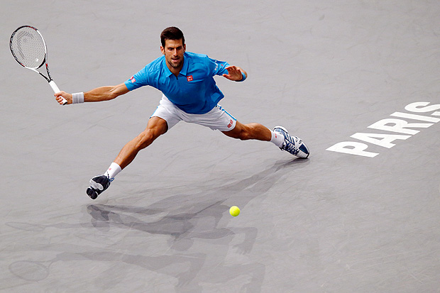 Serbia's Novak Djokovic returns the ball to Luxembourg's Gilles Muller during the 2nd round of the Paris Masters tennis tournament at the Bercy Arena in Paris, Wednesday, Nov. 2, 2016. Djokovic won 6-3, 6-4. (AP Photo/Michel Euler) ORG XMIT: MEU111
