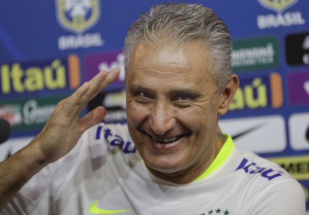 Brazil's coach Tite smiles during a press conference 