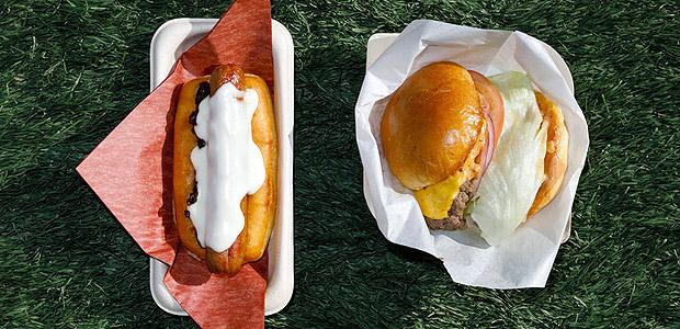 At the new stadium for the Atlanta Falcons that will open next season, prices will be kept low, even for specialty items like the Mitchell dog in a sweet bun ($6) and the classic cheeseburger ($5). Credit Dustin Chambers for The New York Times 