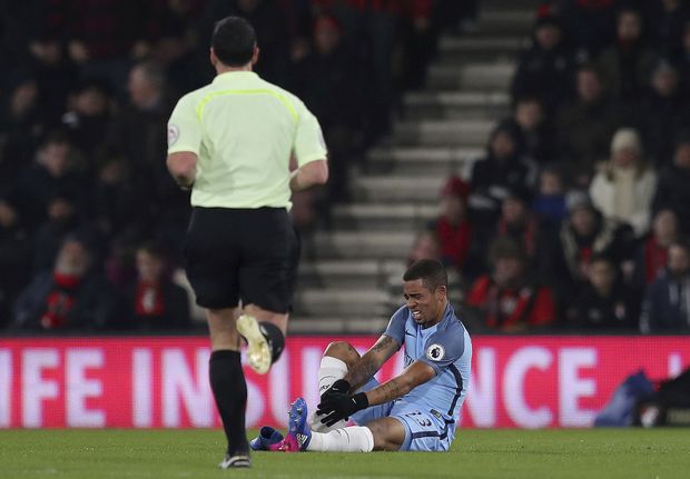 Manchester City's Gabriel Jesus sits on the pitch during their English Premier League soccer match against Bournemouth, at the Vitality Stadium in Bournemouth, England, Monday Feb. 13, 2017. (Andrew Matthews/PA via AP) ORG XMIT: LON823