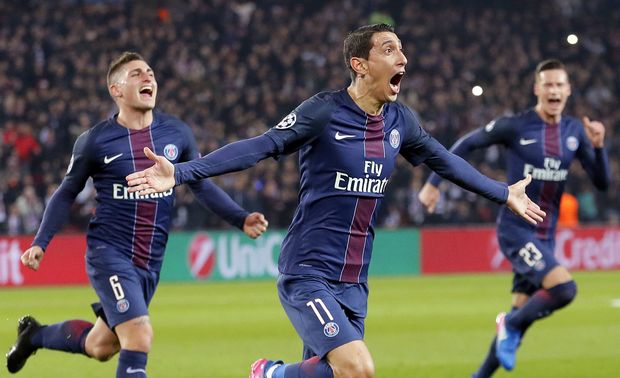 PSG's Angel Di Maria, center, celebrates after scoring the first goal of the game during the Champion's League round of 16, first leg soccer match between Paris Saint Germain and Barcelona at the Parc des Princes stadium in Paris, Tuesday, Feb. 14, 2017. (AP Photo/Francois Mori) ORG XMIT: LLT211