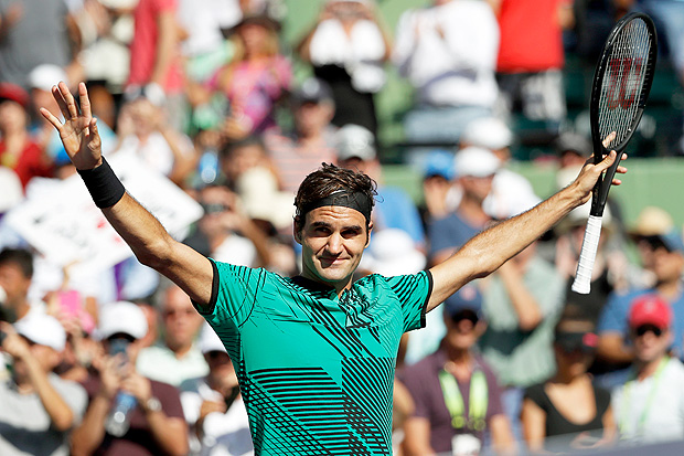 Mar 27, 2017; Miami, FL, USA; Roger Federer of Switzerland celebrates after winning match point against Juan Martin del Potro of Argentina (not pictured) on day seven of the 2017 Miami Open at Crandon Park Tennis Center. Federer won 6-3, 6-4. Mandatory Credit: Geoff Burke-USA TODAY Sports ORG XMIT: USATSI-357191