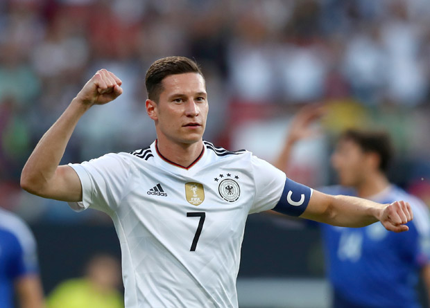 Germany's Julian Draxler celebrates his goal at 1:0 during the World Cup qualifier Group C soccer match between Germany and San Marino at the Stadion Nuernberg in Nuremberg, Germany, Saturday June 10, 2017. (Daniel Karmann/dpa via AP) ORG XMIT: LON853