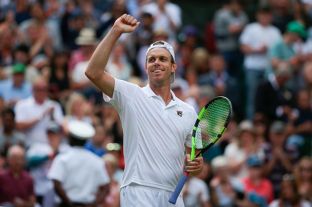 US player Sam Querrey celebrates beating Britain's Andy Murray during their men's singles quarter-final match on the ninth day of the 2017 Wimbledon Championships at The All England Lawn Tennis Club in Wimbledon, southwest London, on July 12, 2017. Querrey won 3-6, 6-4, 6-7, 6-1, 6-1. / AFP PHOTO / Daniel LEAL-OLIVAS / RESTRICTED TO EDITORIAL USE