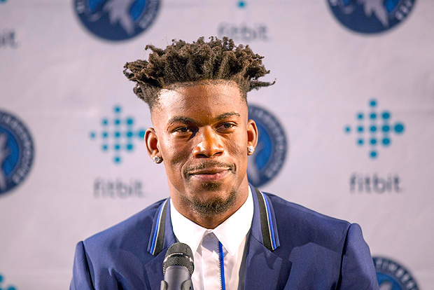 Minnesota Timberwolves new point guard Jimmy Butler smiles during a press conference at Mall of America in Bloomington, Minn., on Thursday, June 29, 2017.(AP Photo/Andy Clayton-King) ORG XMIT: MNAK104