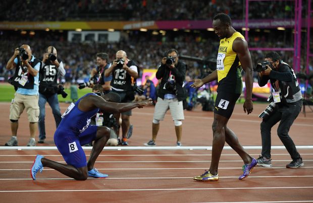 Athletics - World Athletics Championships - men's 100 m final - London Stadium, London, Britain - August 5, 2017 - Justin Gatlin of the U.S. and Usain Bolt of Jamaica react after the race. REUTERS/Phil Noble ORG XMIT: MMA169