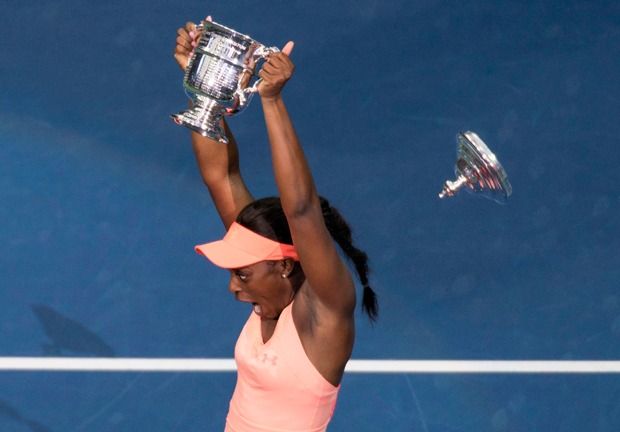 Sloane Stephens, of the United States, reacts as the lid to the championship trophy falls off during a photo app after the women's singles final of the U.S. Open tennis tournament, Saturday, Sept. 9, 2017, in New York. Stephens beat Madison Keys, of the United States to win the championship. (AP Photo/Nick Didlick) ORG XMIT: USO211