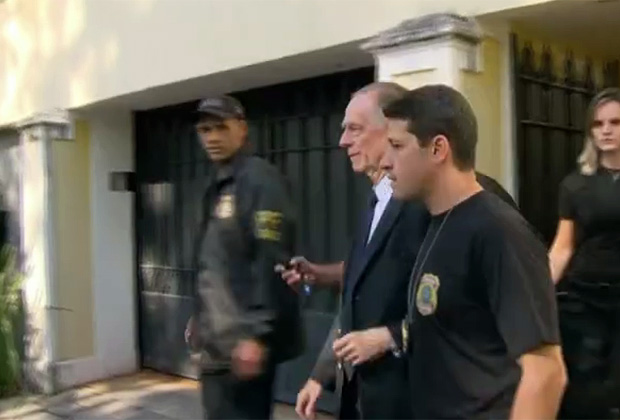 Carlos Nuzman, President of the Brazilian Olympic Committee, is escorted by federal police officers after being taken into custody at his home, in Rio de Janeiro 