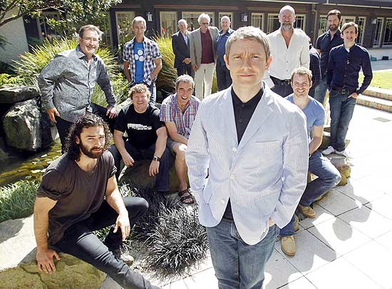 ORG XMIT: WEL100 British actor Martin Freeman (front) poses with cast members of Peter Jackson's two-part film The Hobbit, at Jackson's Park Road Post facility in Wellington February 11, 2011. Freeman plays Bilbo, one of thirteen dwarves featured in the film. REUTERS/Anthony Phelps (NEW ZEALAND - Tags: ENTERTAINMENT)