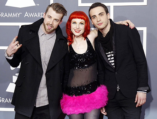 ORG XMIT: LOA89 Hayley Williams (C), Taylor York and Jeremy Davis (L) of rock band Paramore arrive at the 53rd annual Grammy Awards in Los Angeles, California, February 13, 2011. REUTERS/Danny Moloshok (UNITED STATES - Tags: ENTERTAINMENT) (GRAMMYS-ARRIVALS)