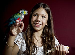 Maria Isabel, 10, tem duas aves silvestres certificadas