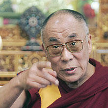 Tibetan spiritual leader the Dalai Lama gestures as he speaks to the media in Dharmsala, India, Tuesday, March 18, 2008. The Dalai Lama threatened Tuesday to step down as leader of Tibet's government in exile if violence committed by Tibetans in his homeland spirals out of control.(AP Photo/Gurinder Osan)