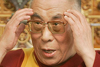 Tibetan spiritual leader the Dalai Lama speaks to the media in Dharmsala, India, Tuesday, March 18, 2008. The Dalai Lama threatened Tuesday to step down as leader of Tibet's government in exile if violence committed by Tibetans in his homeland spirals out of control.(AP Photo/Gurinder Osan)