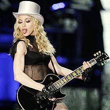 U.S. singer Madonna performs on stage as part of her 'Sticky and Sweet' tour at Wembley Stadium in London, Thursday, Sept. 11, 2008. (AP Photo/Matt Dunham)