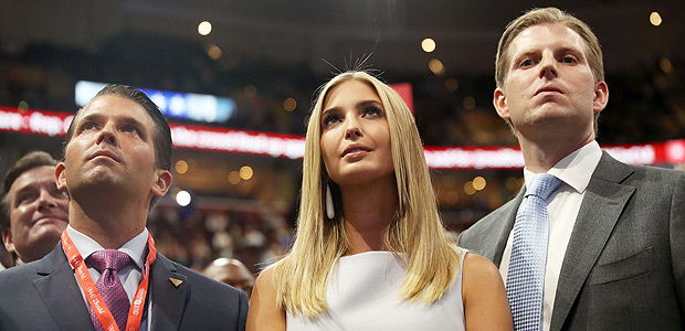 CLEVELAND, OH - JULY 19: Donald Trump Jr. (L), Ivanka Trump (C), Eric Trump (R), take part in the roll call on the second day of the Republican National Convention on July 19, 2016 at the Quicken Loans Arena in Cleveland, Ohio. An estimated 50,000 people are expected in Cleveland, including hundreds of protesters and members of the media. The four-day Republican National Convention kicked off on July 18. Joe Raedle/Getty Images/AFP == FOR NEWSPAPERS, INTERNET, TELCOS & TELEVISION USE ONLY ==