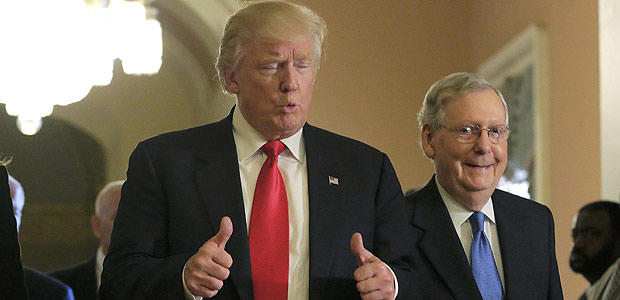 U.S. President-elect Donald Trump (L) gives a thumbs up sign as he walks with Senate Majority Leader Mitch McConnell (R-KY) on Capitol Hill in Washington, U.S., November 10, 2016. REUTERS/Joshua Roberts ORG XMIT: WAS718