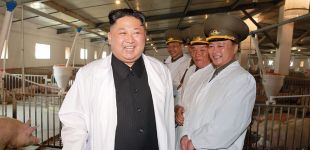 North Korean Leader Kim Jong Un visited the Thaechon Pig Farm of the Air and Anti-Air Force of the Korean People's Army in this undated handout photo by North Korea's Korean Central News Agency (KCNA) made available on April 23, 2017. KCNA/Handout via REUTERS ATTENTION EDITORS - THIS IMAGE WAS PROVIDED BY A THIRD PARTY. EDITORIAL USE ONLY. REUTERS IS UNABLE TO INDEPENDENTLY VERIFY THIS IMAGE. NO THIRD PARTY SALES. SOUTH KOREA OUT. TPX IMAGES OF THE DAY ORG XMIT: SIN901