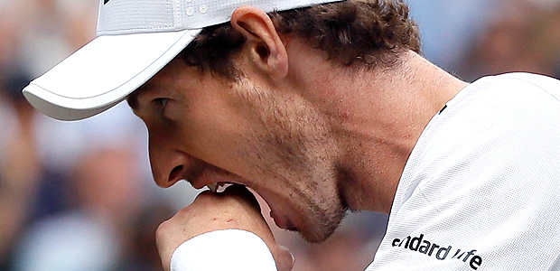 Britain's Andy Murray reacts as he loses a point to Sam Querrey of the United States during their Men's Singles Quarterfinal Match on day nine at the Wimbledon Tennis Championships in London Wednesday, July 12, 2017. (AP Photo/Kirsty Wigglesworth) ORG XMIT: WIM199