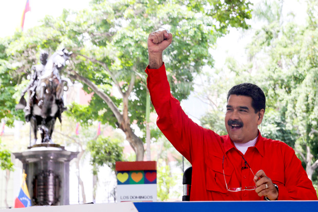 Venezuela's President Nicolas Maduro gestures while he speaks during his weekly broadcast 