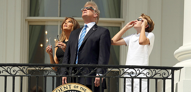 President Donald Trump, first lady Melania Trump and their son Barron watch the solar eclipse, Monday, Aug. 21, 2017, at the White House in Washington. (AP Andrew Harnik) ORG XMIT: DCAH205