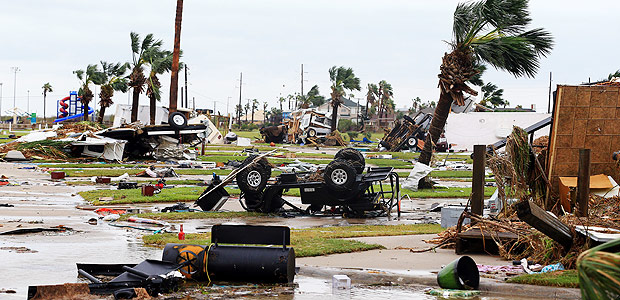 A mobile park is destroyed after Hurricane Harvey landed in the Coast Bend area on Saturday, Aug. 26, 2017, in Port Aransas, Texas. The National Hurricane Center has downgraded Harvey from a Category 1 hurricane to a tropical storm. Harvey came ashore Friday along the Texas Gulf Coast as a Category 4 storm with 130 mph winds, the most powerful hurricane to hit the U.S. in more than a decade. (Gabe Hernandez/Corpus Christi Caller-Times via AP) ORG XMIT: TXCOR107
