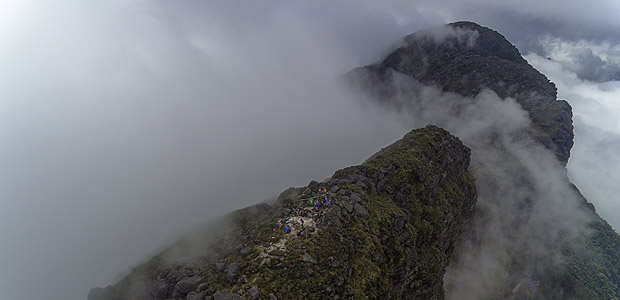 Picture taken by a drone portrays the 11-person team, which Folha was part of, that hiked to the top of the Pico da Neblina (Fog Peak)