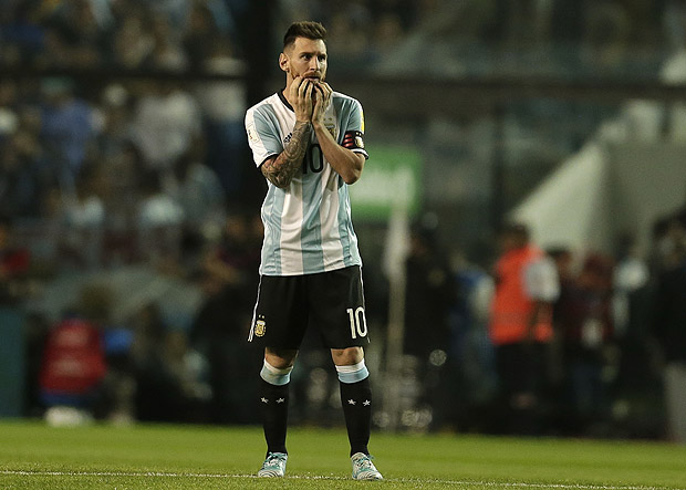 Argentina's Lionel Messi walks on the pitch in disbelief after a World Cup qualifying soccer match against Peru, at La Bombonera stadium in Buenos Aires, Argentina, Thursday, Oct. 5, 2017. Argentina played Peru to a 0-0 draw leaving them with little possibility to make it to the World Cup in Russia. (AP Photo/Victor R. Caivano) ORG XMIT: VC129